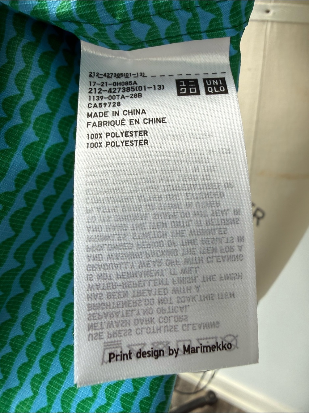 Marimekko x Uniqlo Pocketable Hooded Long lightweight jacket - Picture 8 of 8